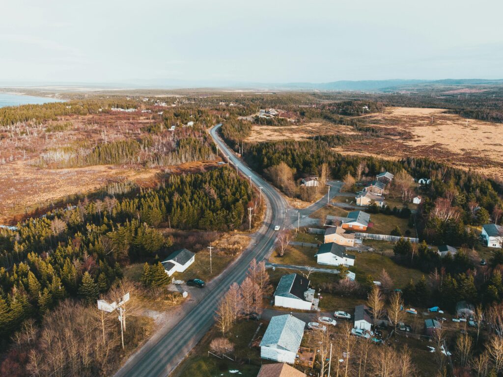Overhead view of small rural town with houses along roadway